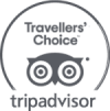 The image displays the Travelers' Choice logo from TripAdvisor, featuring an owl's face and the site name beneath.